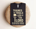 Trained by Trials Graphic Tee product image 1